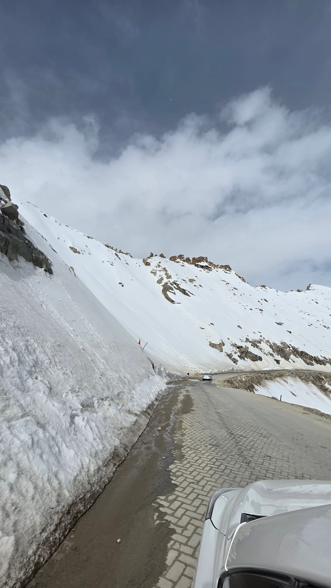 The snow-walled road near the top of Khardung La